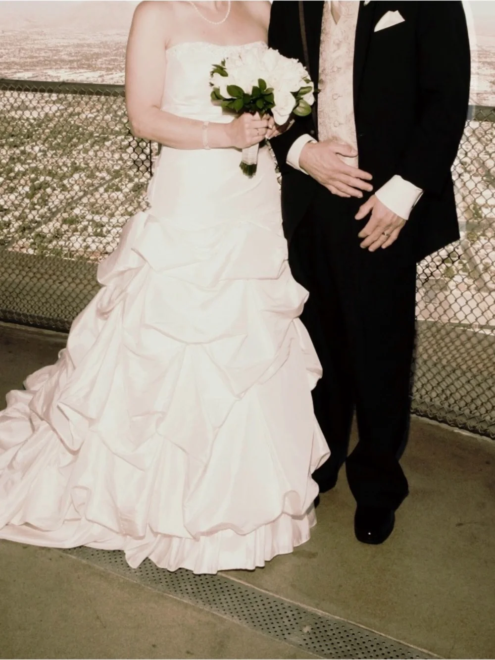 White Bridal Gown. Tag says size 10 but it definitely ran small.